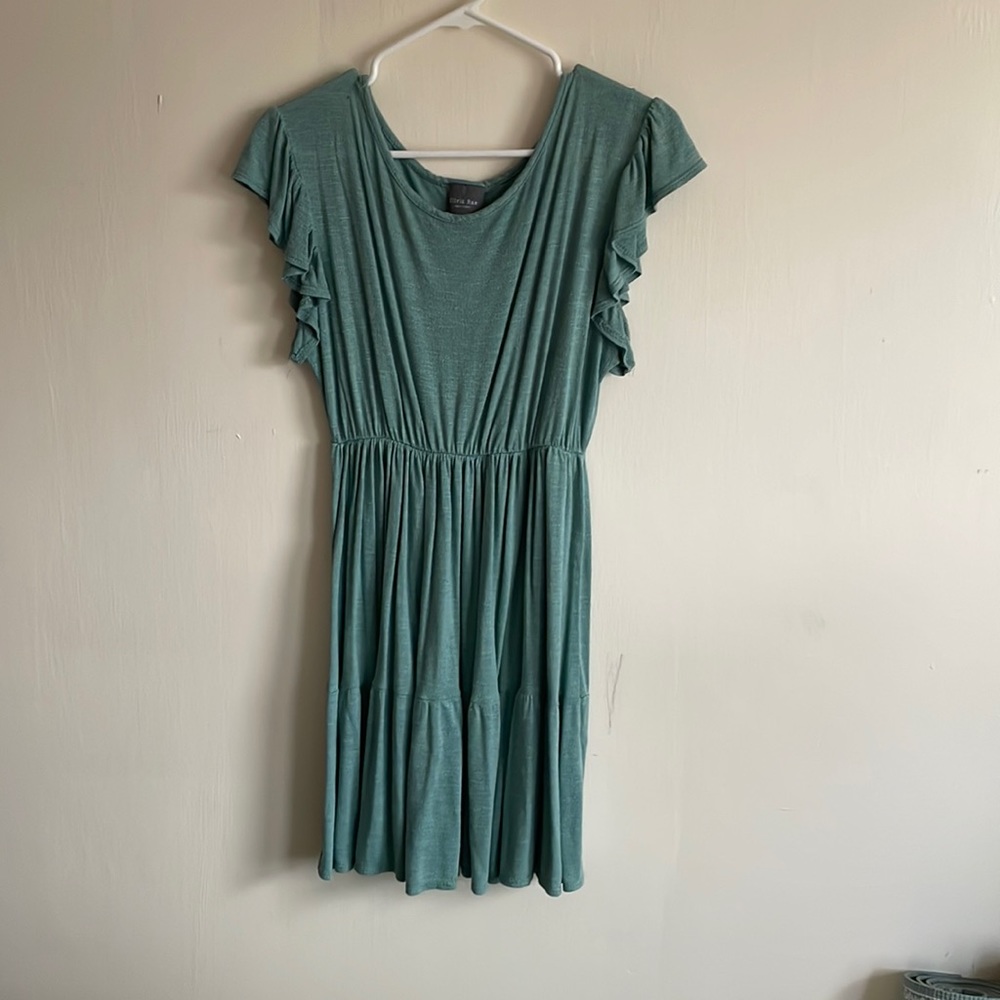 Teal colored dress flowy, size medium in great condition.